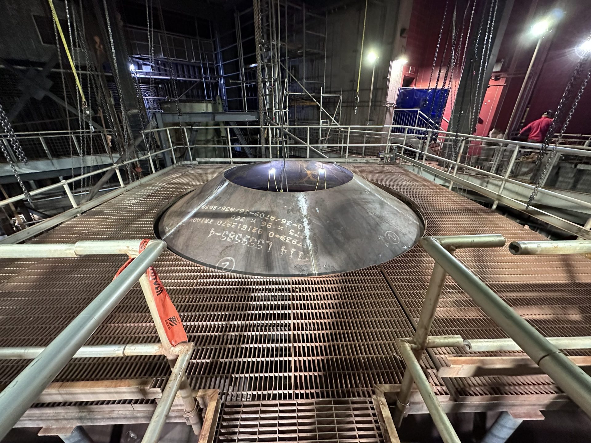 A set of metal stairs designed for industrial use, showcasing clean lines and robust construction.