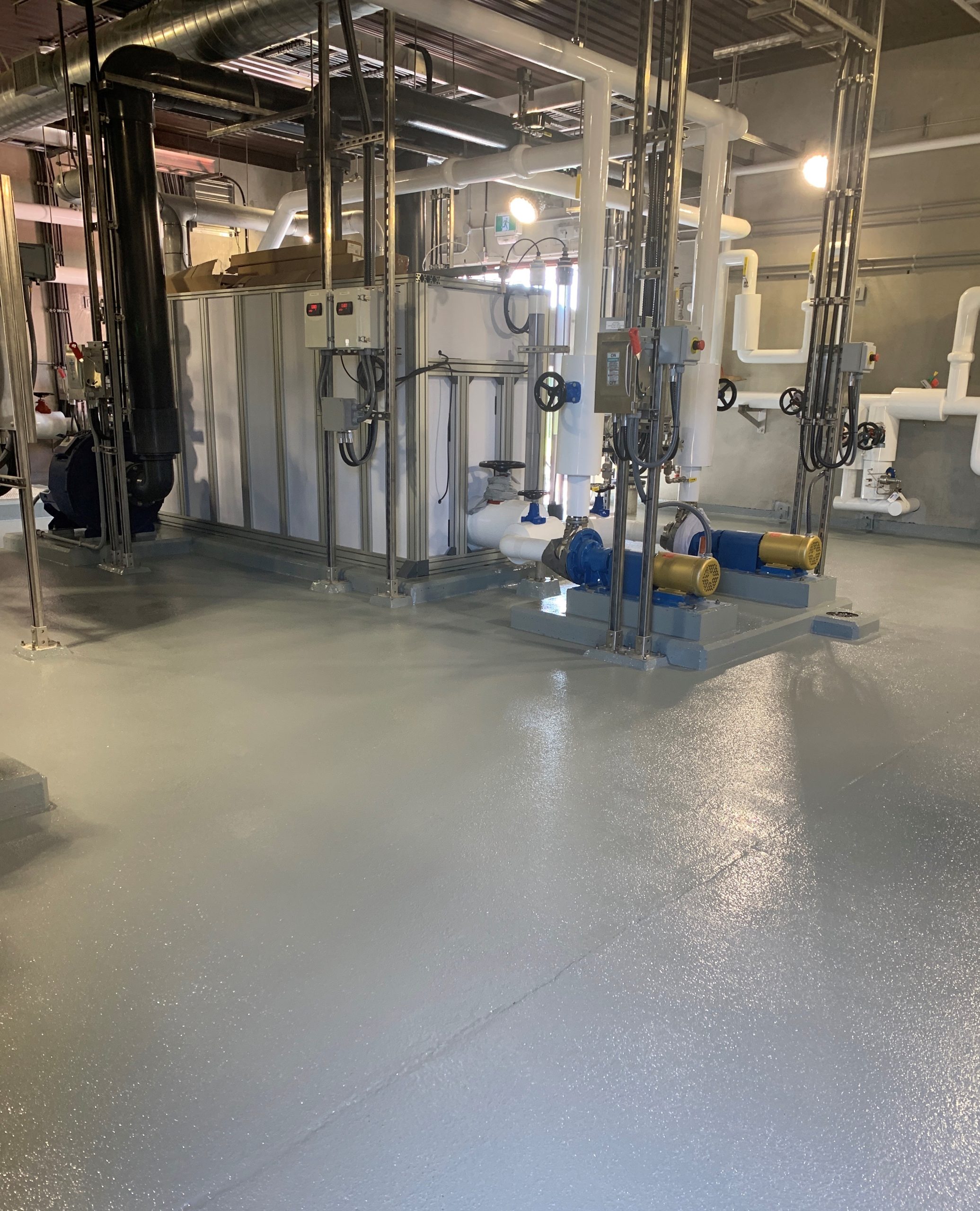 A clean and modern silver tile flooring design.